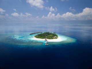 The Archipelago of Echoes: A Tale of Two Maldives